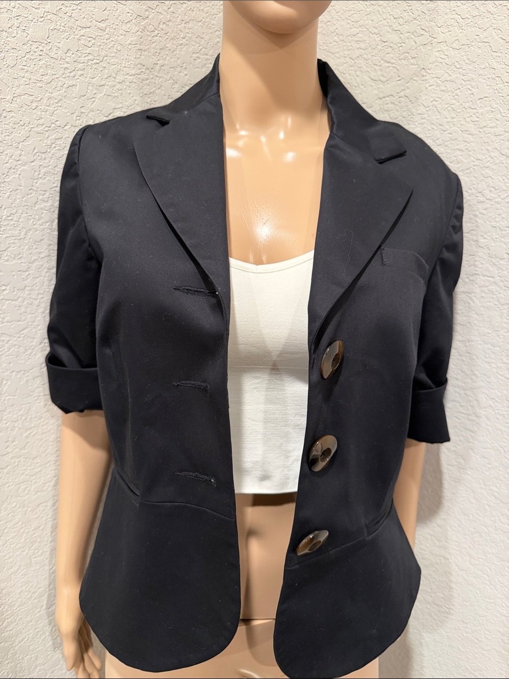 NWOT Harold’s black SS jacket w/ brown buttons, faux pockets.